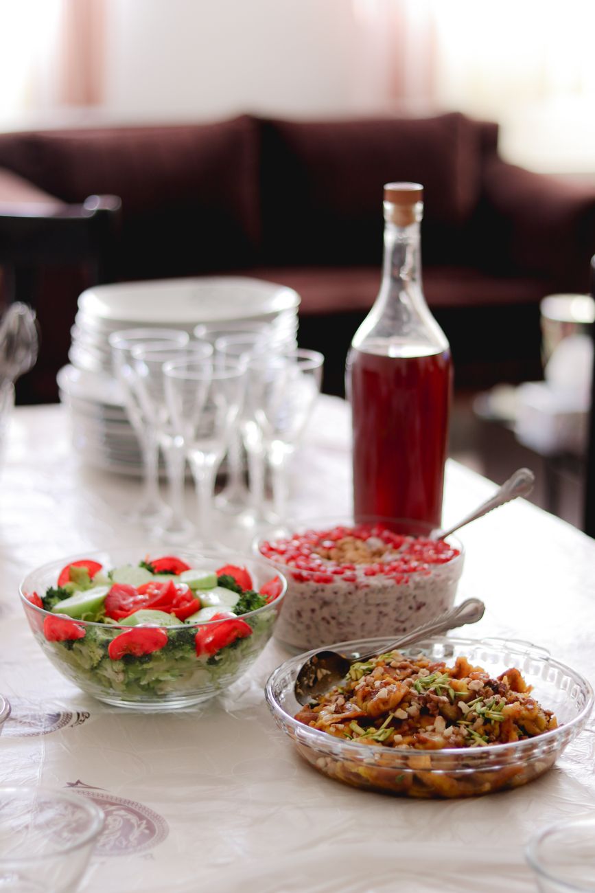 Image illustrating: A Palestinian buffet table in a modest Charleroi restaurant setting (editorial)